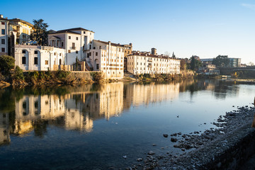 View of Bassano del Grappa, in Italy, from the river beside the castle