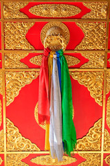 gold decoration on the door in a temple