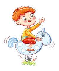 Boy riding on the spring rocking-horse
