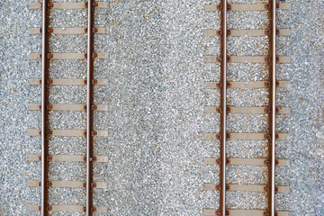 Top view of railroad tracks and abstract background