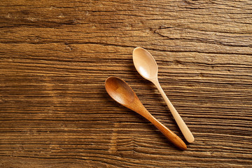 Wooden spoon on wooden desktop
