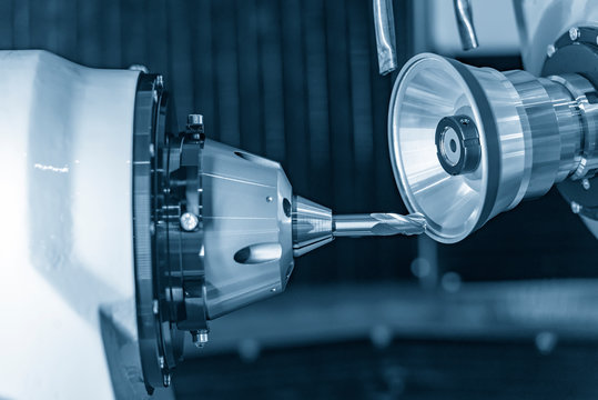 The operation of tool making machine control by computer program.Cutting tool making machine control by CNC program. The CNC carbide cutting tool manufacturing process by grinding machine