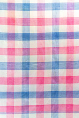 Thai Kamar cloth texture with three strips color is pink, blue and white. Perfect for background.