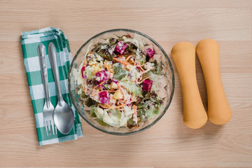 Desk table with healthy food on wooden table with lemonade and drumble .Top view with copy space.