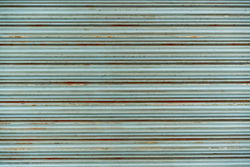 Steel rustic vintage rolling door. Rustic shutter door texture. Perfect for background.