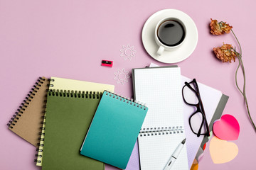 Flat lay composition with stationery on pink background. Mock up for design