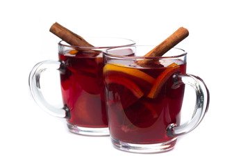 mulled wine with spices isolated on white background