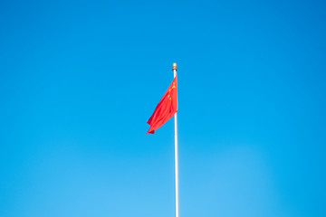 China flag on blue sky