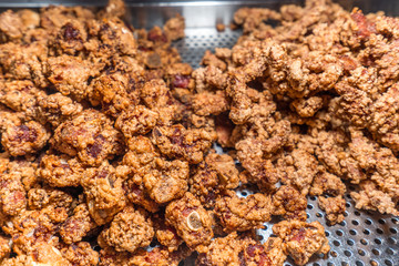 Fresh and delicious Taiwanese deep fried chicken (Salt crispy chicken) in Taiwan's night market, close up.