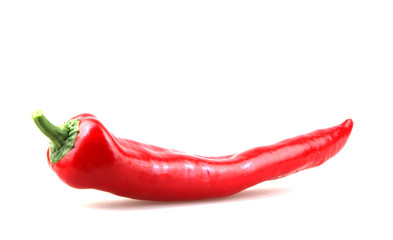 Close-Up Of Red Chili Pepper Against White Background