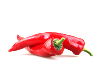 Close-Up Of Red Chili Pepper Against White Background