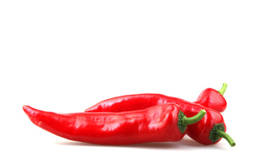 Close-Up Of Red Chili Pepper Against White Background