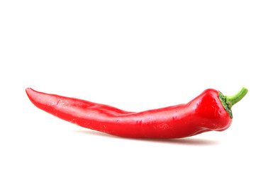 Close-Up Of Red Chili Pepper Against White Background