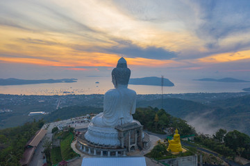 aerial view sunset at Phuket big Buddha viewpoint. Phuket Big Buddha is one of the island most important .and revered landmarks on Phuket island. © Narong Niemhom
