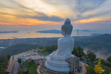 aerial view sunset at Phuket big Buddha viewpoint. Phuket Big Buddha is one of the island most important .and revered landmarks on Phuket island. © Narong Niemhom