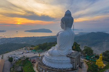 aerial view sunset at Phuket big Buddha viewpoint. Phuket Big Buddha is one of the island most important .and revered landmarks on Phuket island. © Narong Niemhom