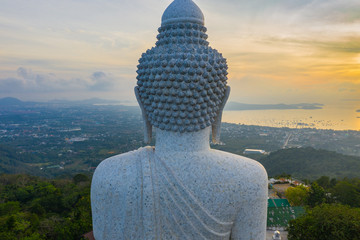 aerial view sunset at Phuket big Buddha viewpoint. Phuket Big Buddha is one of the island most important .and revered landmarks on Phuket island. © Narong Niemhom