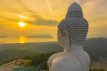 aerial view sunset at Phuket big Buddha viewpoint. Phuket Big Buddha is one of the island most important .and revered landmarks on Phuket island. © Narong Niemhom