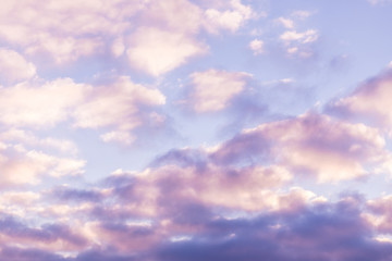 Obraz premium The vivid sky or heaven background of blue, red, crimson and purple clouds of evening sunset or morning daybreak