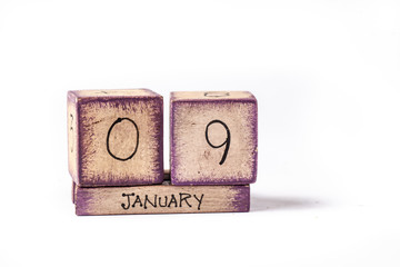 Colorful Wooden Block Perpetual Calendar Showing January 9th