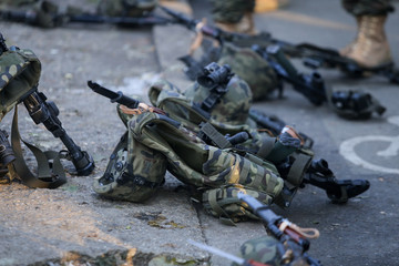 Assault rifles, army helmets with cameras and other army objects