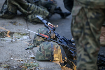Assault rifles, army helmets with cameras and other army objects
