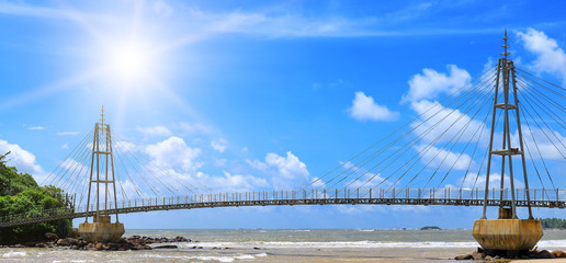 Bridge to island, ocean and sun in blue sky (Matara, Sri Lanka) Wide photo