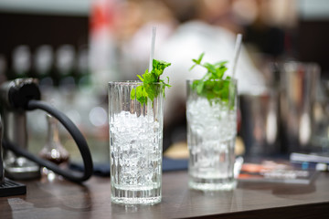 Two glasses with ice and mint