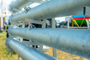 Metal pipes in the exhibition, new samples, worn texture