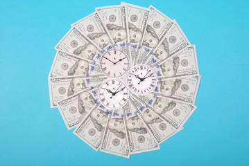 Concept of clock and dollar. Clock on mandala kaleidoscope from money. Abstract money background...