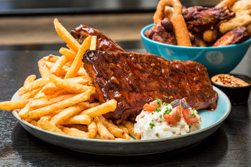 American food, spare ribs, burgers, fried onions