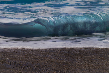 Sea wave background. View of the waves from the beach