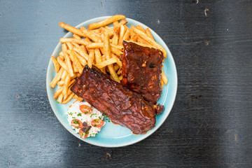 American food, spare ribs, burgers, fried onions