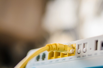 internet modem router hub with a ethernet cable connecting
