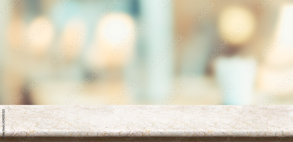 Aufkleber Empty glossy marble table and blurred soft light table in restaurant with bokeh background. product display template.Business presentation.