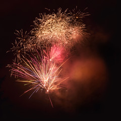 Firework in new year or silvester night on the dark sky
