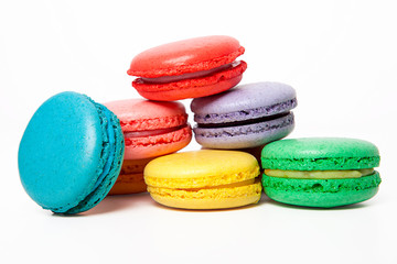 Sweet and colourful macaroons or macaron on white background.
