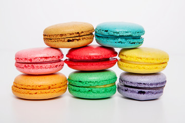 Sweet and colourful macaroons or macaron on white background.