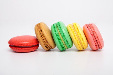 Sweet and colourful macaroons or macaron on white background.