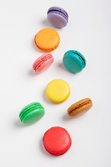 Sweet and colourful macaroons or macaron on white background.