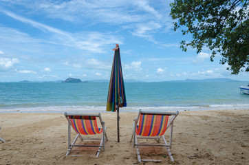 Beach chairs and umbrellas