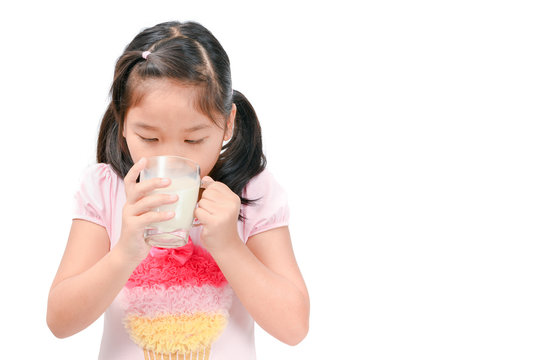 Cute Asian Girl Drinking Fresh Milk Isolated