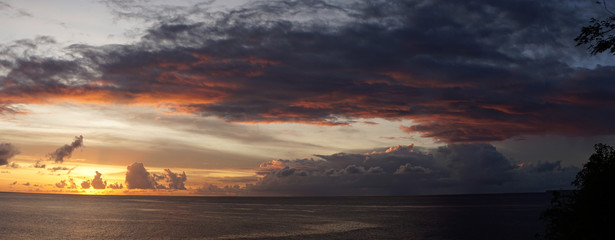 Sunset over the oceanat Grand Anse Beach near St George's, Granada, Caribbean Island.
