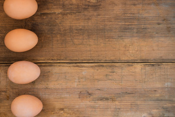 Easter eggs on wooden old background.