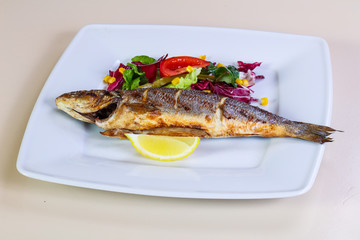 Grilled seabass with lemon