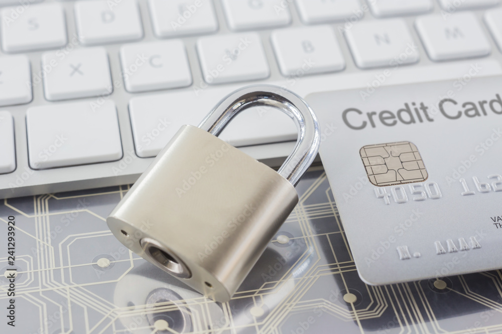 Wall mural padlock and credit card on digital circuits, keyboard.