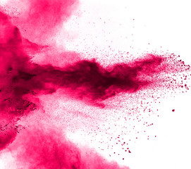 Pink color powder explosion on white background.