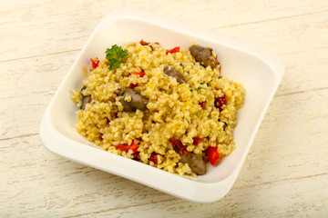Bulgur with chicken hearts