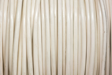 Electrical cable closeup. High and low voltage cables in the storage. Electrical cable, energy and technology equipment. background