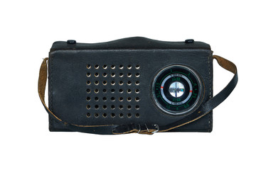 Old soviet radio in a leather case isolated on white background